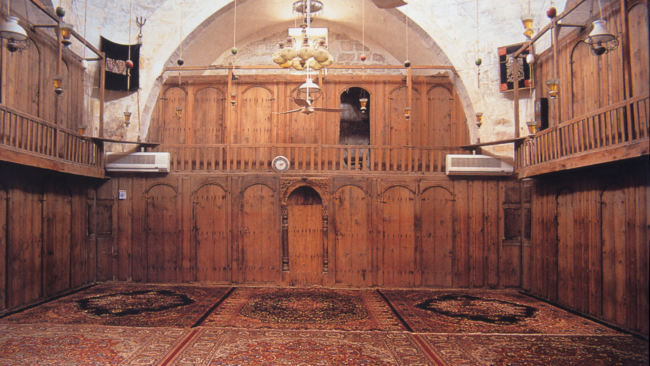 Az-Zawiya al-Hilaliyya, wooden cells inside the prayer hall's iwan